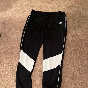 Nike Black and White Sweatpants with Color-Blocking Design